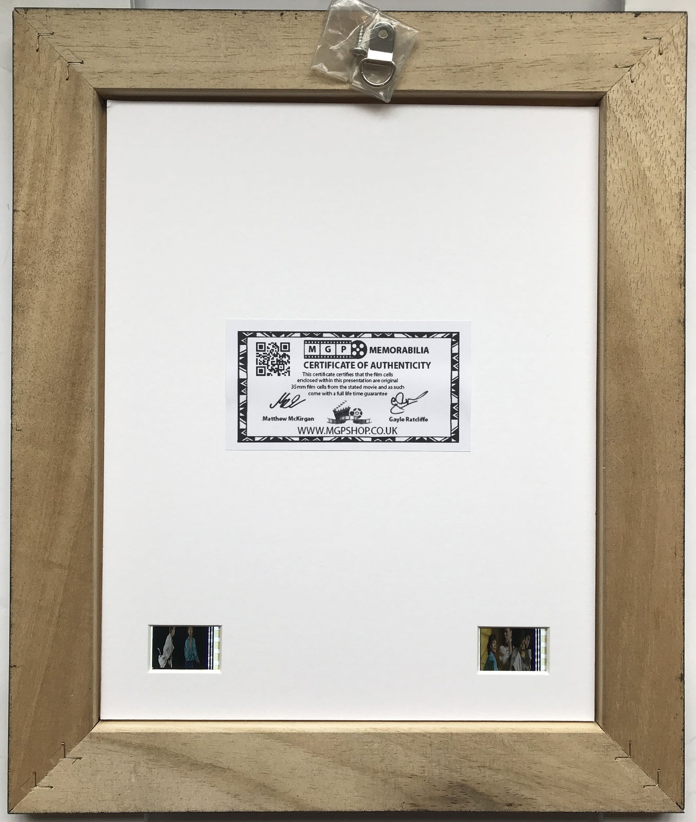 Handmade display featuring original 35mm film cells for BOWIE & JAGGER 1985 fans