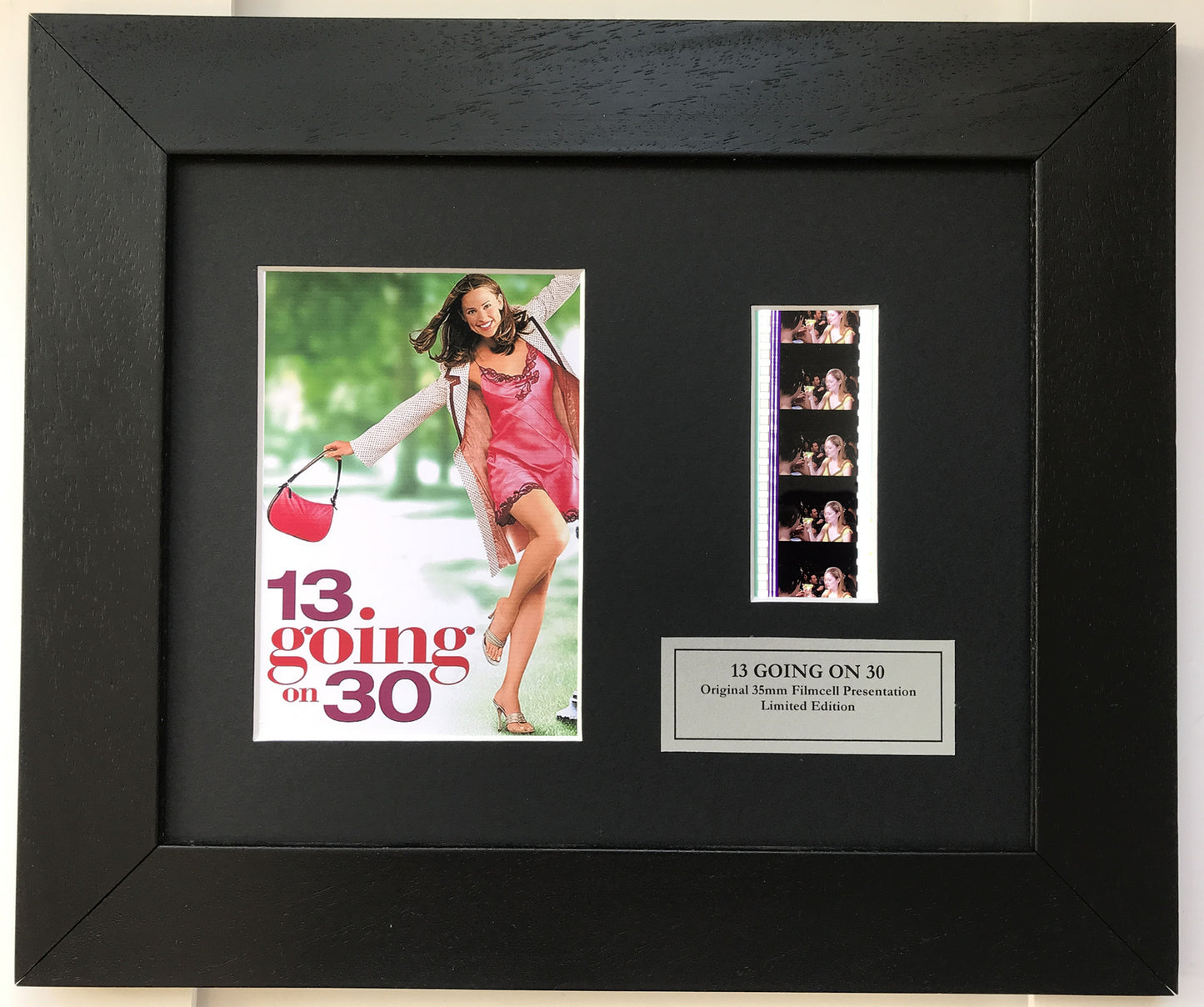 Handmade display featuring original 35mm film cells for 13 GOING ON 30 fans