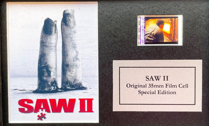 Handmade display featuring original Mini 35mm film cells for a SAW II fan + COA