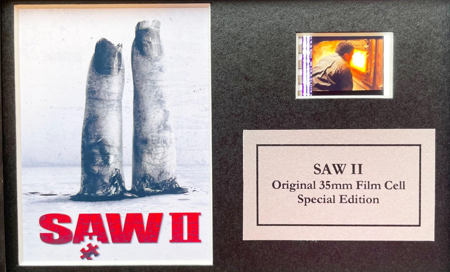 Handmade display featuring original Mini 35mm film cells for a SAW II fan + COA