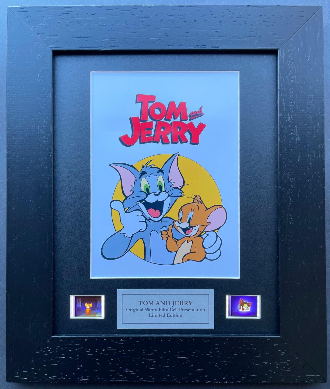 Hand crafted display featuring original 35mm filmcells for Tom & Jerry fans + Coa