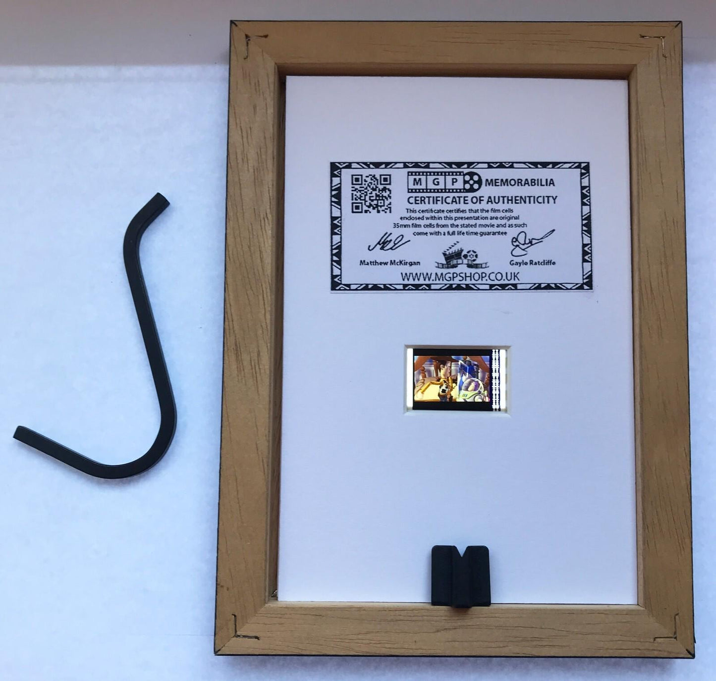 Hand crafted display featuring original Mini 35mm film cells for a TOY STORY fan
