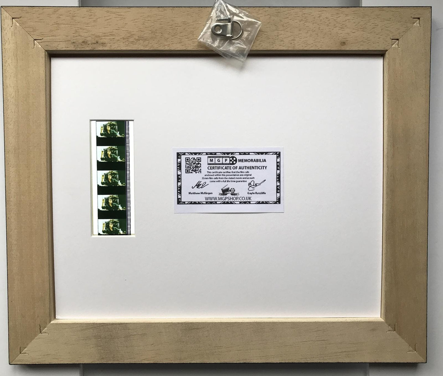 Hand crafted display featuring original 35mm film cells for SCARFACE fans + COA