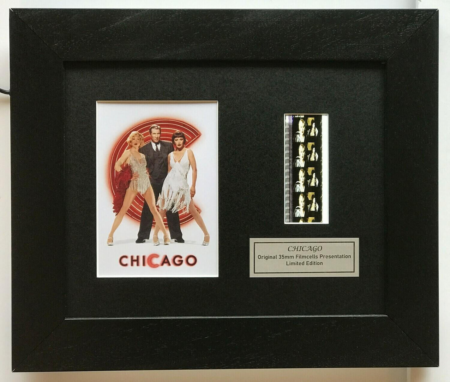 Hand crafted display featuring original 35mm film cells for CHICAGO 2002 fans v1