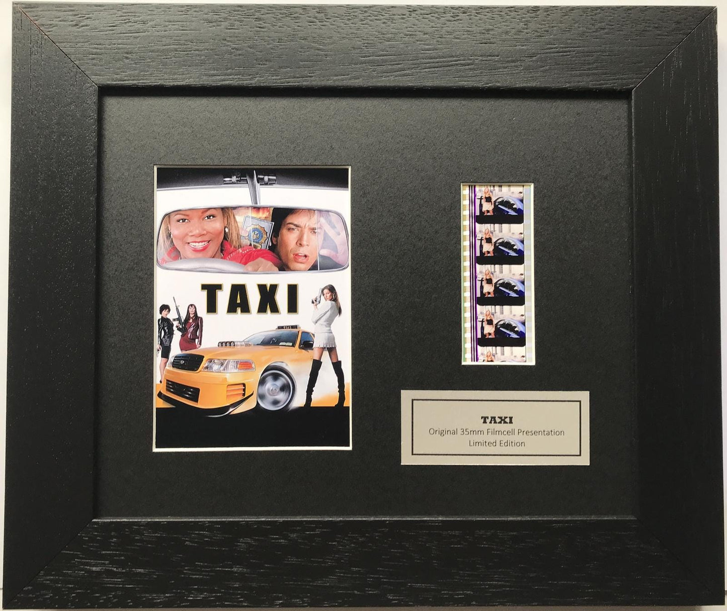 Hand crafted display featuring original 35mm film cells for TAXI 2004 fans + COA