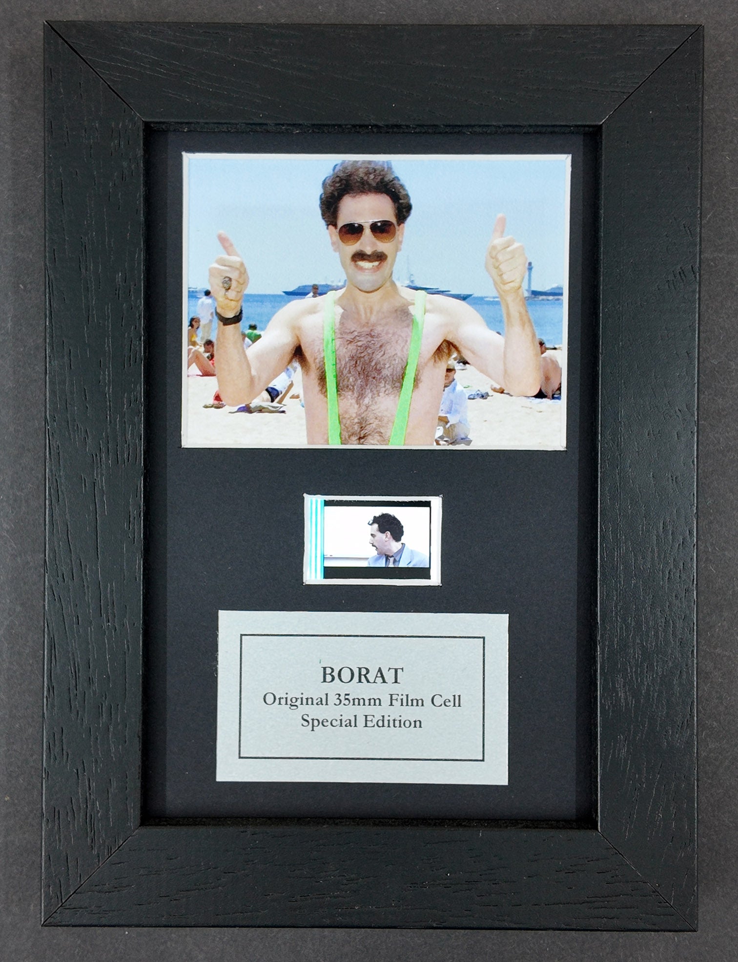 Hand crafted display featuring original 35mm film cells for a BORAT Fan + coa
