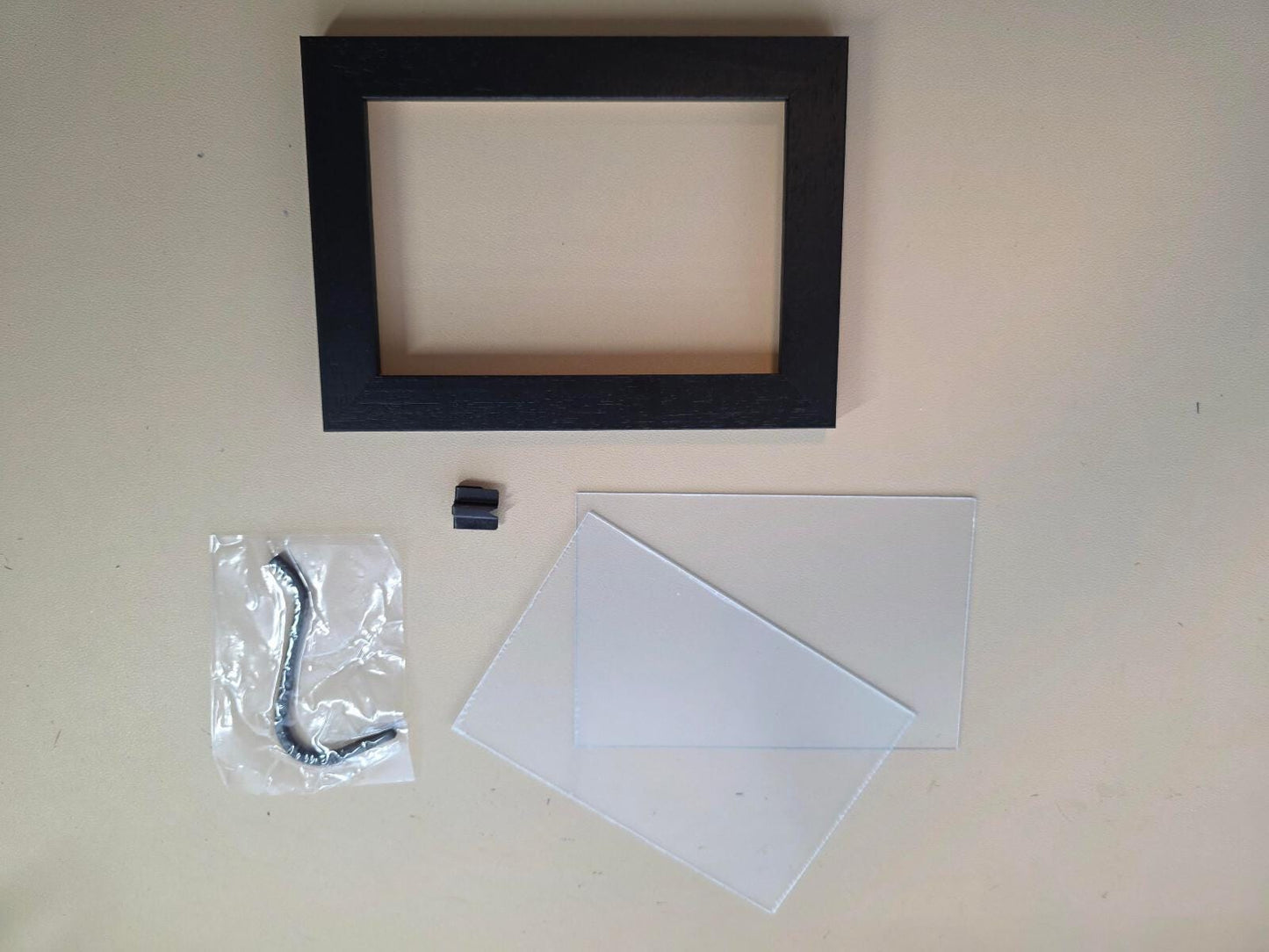Quality wood frame in two sizes, either 130mm x 180mm or 325mm x 275mm
