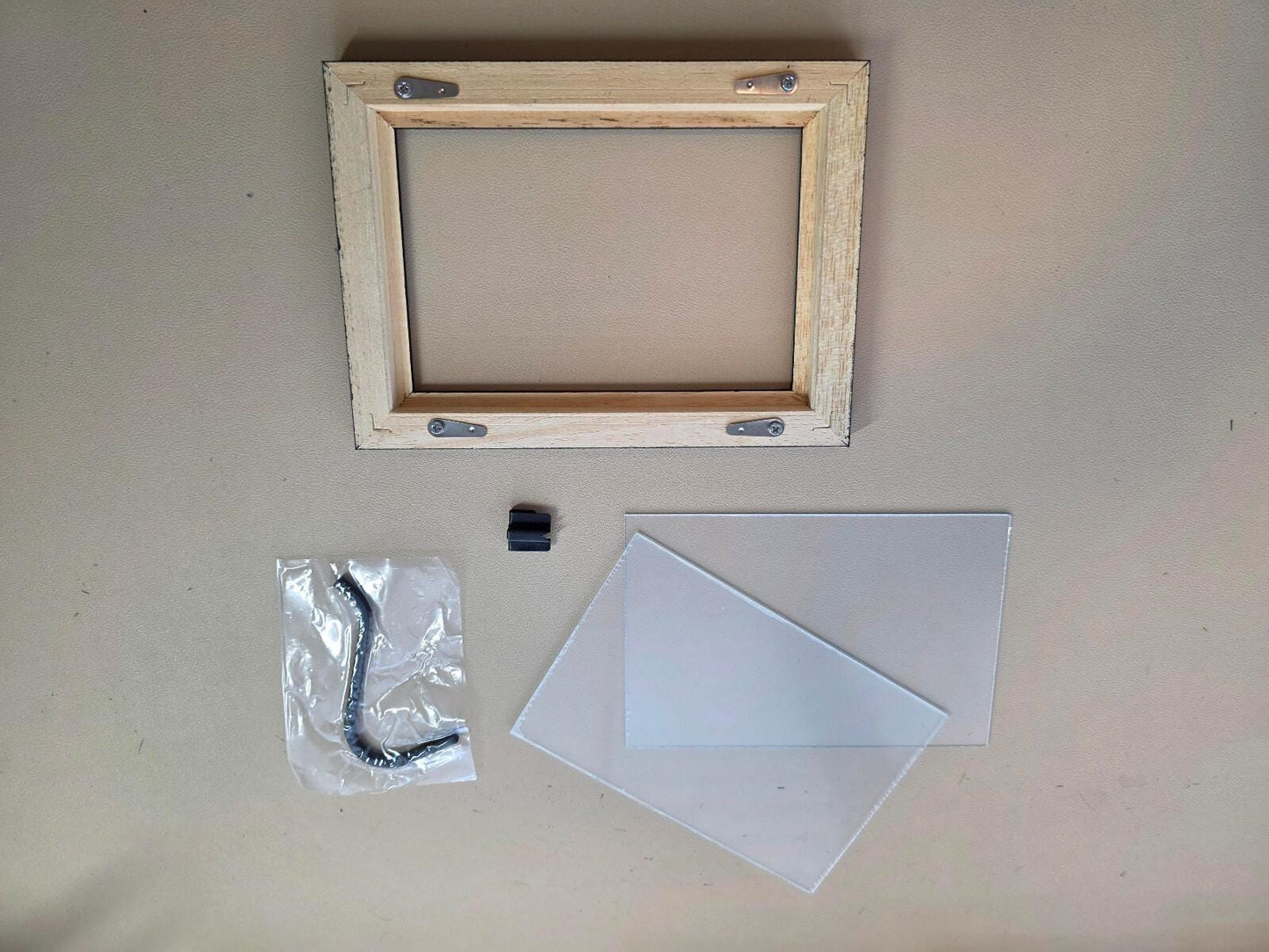Quality wood frame in two sizes, either 130mm x 180mm or 325mm x 275mm